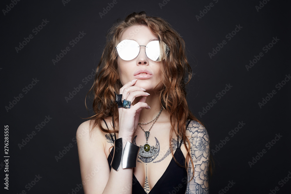 fashion portrait of Beautiful sexy woman with tattoo fashion portrait of Beautiful sexy woman with tattoo