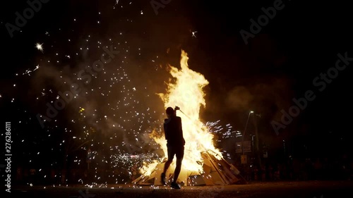 San Joan Night Celebration. Traditional summer fire night in Catalonia, Spain. Fireworks and fiesta. Big fires and fireworks are on the streets. Nightlife.