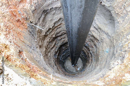 Water Well Drilling, Dig a well for water, Inside The Well, Groundwater hole drilling machine, boreholes photo