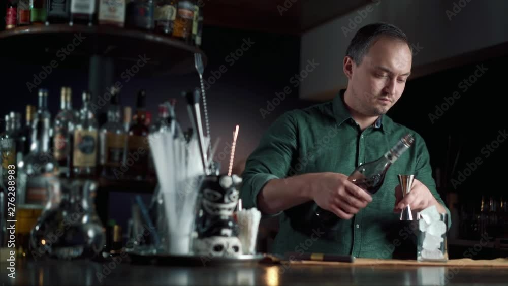 Bartender makes cocktail Bartender makes cocktail