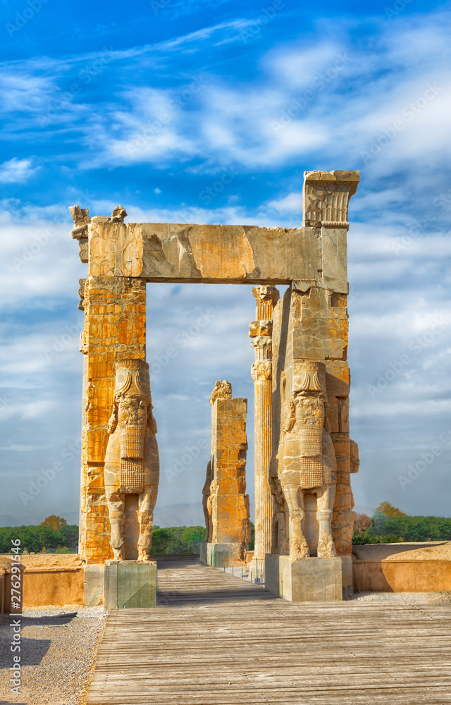 The Gate of All Nation, Persepolis. Iran is the capital of the Achaemenids. The ancient city of the Persians. Bright majestic monuments. Blue sky and clouds background.