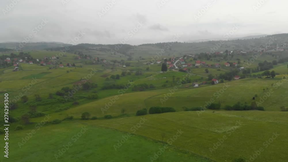 rainy day aerial view of green field