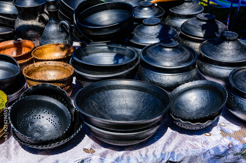 Different clay utensil for sale on a country fair