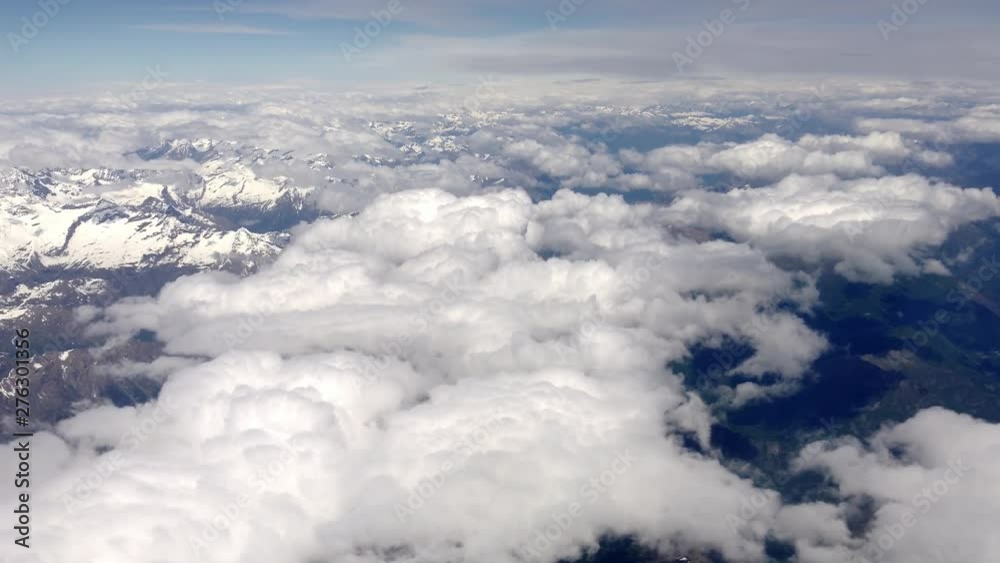 Stunning aerial View of Italian and swiss alps in spring time covered with snow and clouds. 4k footage Stunning aerial View of Italian and swiss alps in spring time covered with snow and clouds. 4k footage