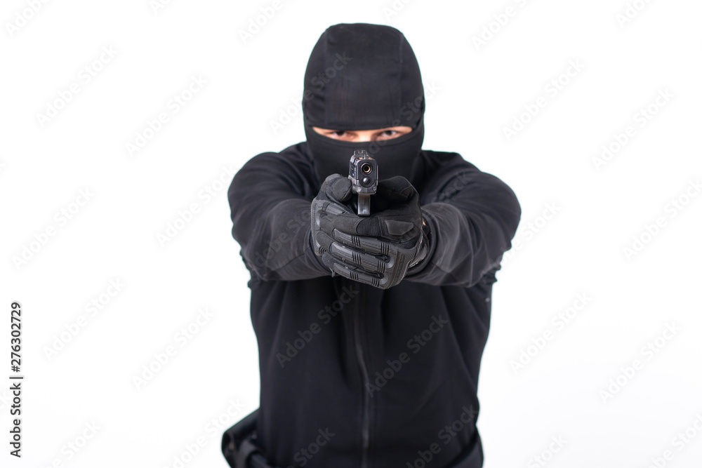 Gunman about to shoot with a gun Gunman about to shoot with a gun