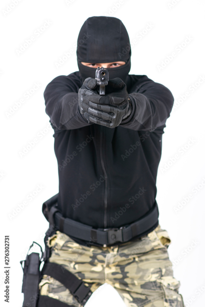 Gunman about to shoot with a gun