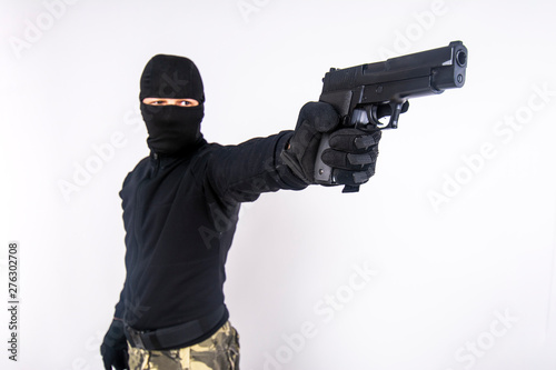 Gunman about to shoot with a gun