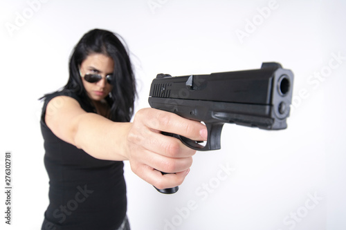 Gangster woman holding a gun