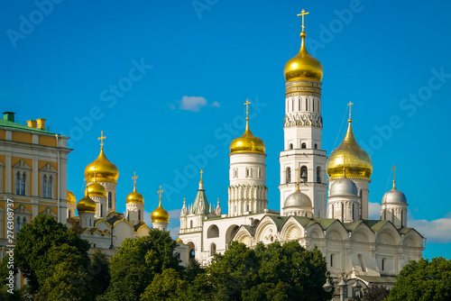 The bell tower of Ivan the Great with the Church of St. John Climacus, view from the Moscow River. This is the highest part of the complex of buildings of the Moscow Kremlin. photo