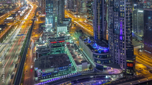 Aerial view to traffic on Sheikh Zayed road and skyscrapers on Dubai downtown night timelapse, Dubai, United Arab Emirates