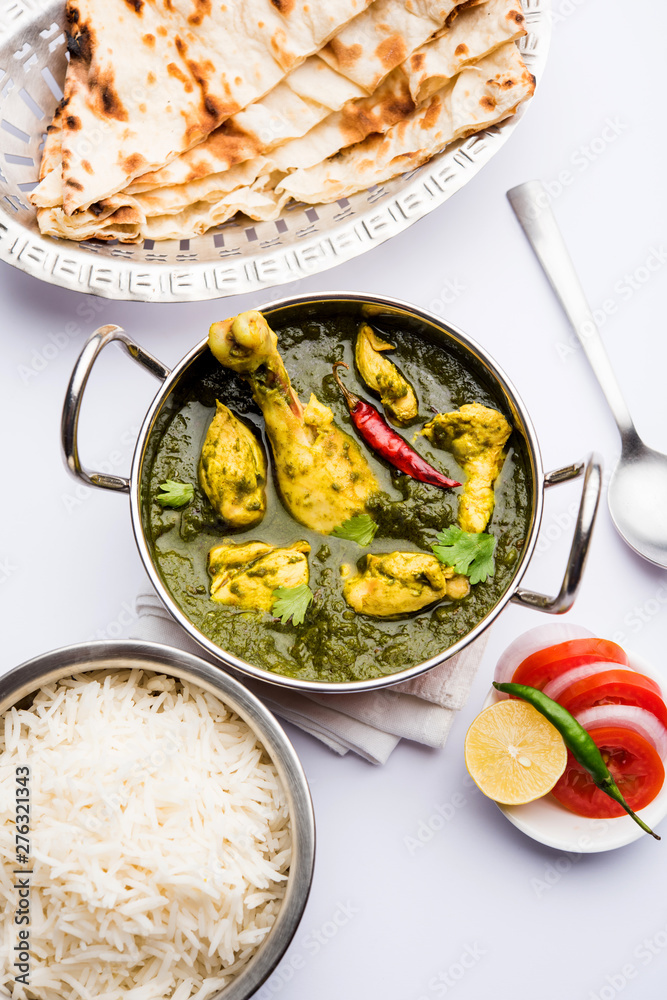 palak/spinach Chicken or Murg Saagwala served in a bowl with Naan and rice palak/spinach Chicken or Murg Saagwala served in a bowl with Naan and rice