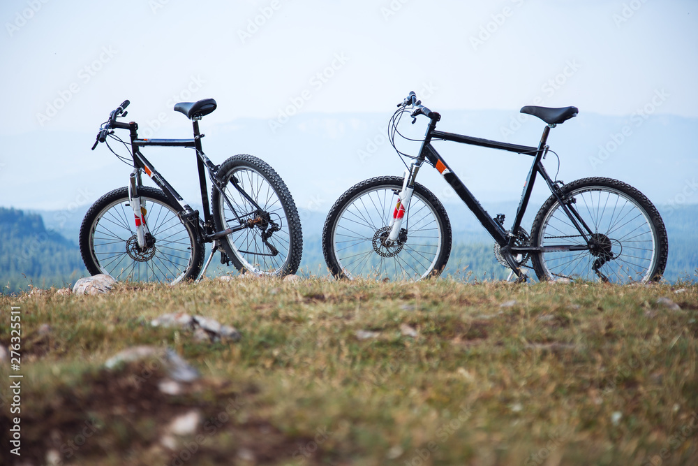 Two bicycles on mountain