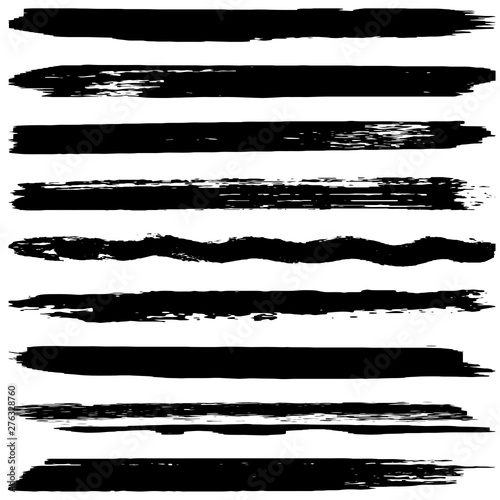 Grunge brush vector. Abstract black spots on white background.