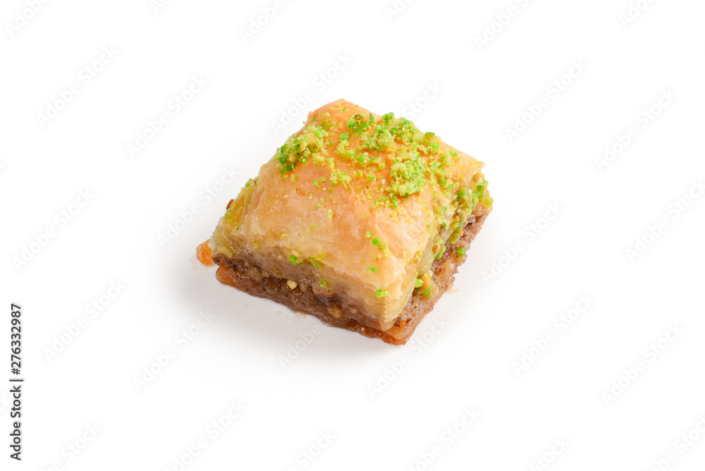 Pistachio baklava on a white background. Dessert. Pistachio baklava on a white background. Dessert.