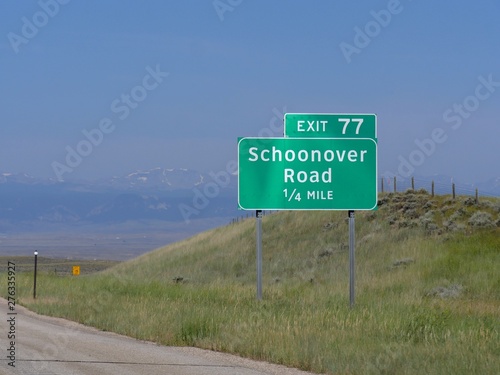 Directional sign by the roadside to Schoonover Road heading to Buffalo City, Wyoming.