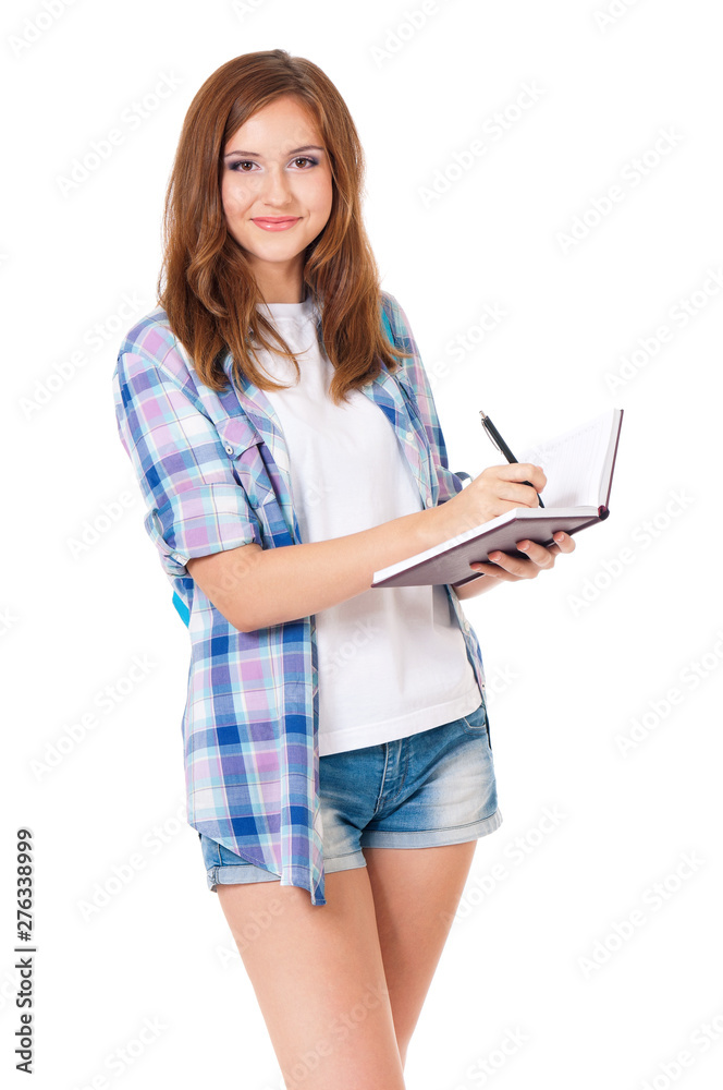Beautiful student girl with notebook and pen, isolated on white background Beautiful student girl with notebook and pen, isolated on white background