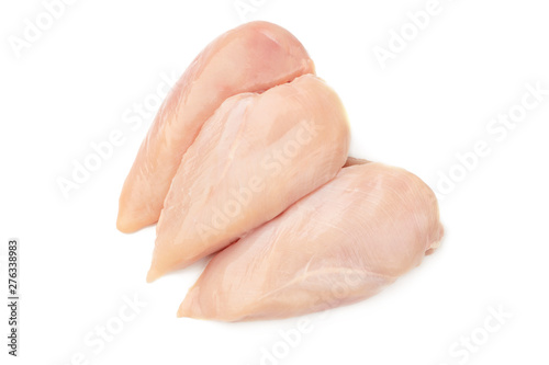 Threee fresh raw chicken breasts on white background.