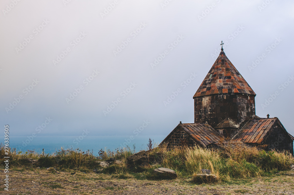 beautiful landscape old Armenian old monastery and beautiful blue lake