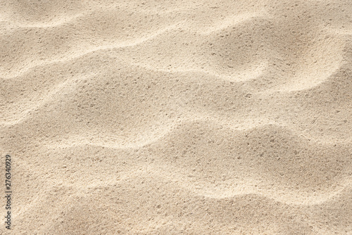 Background for design on the theme of the sea resort. Abstract natural pattern. Sand texture on the beach