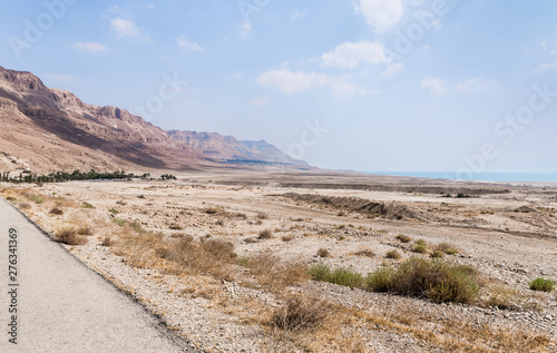 Panoramic  view of the road  coast of Dead Sea and mountains in the Judean Desert in the Dead Sea region in Israel