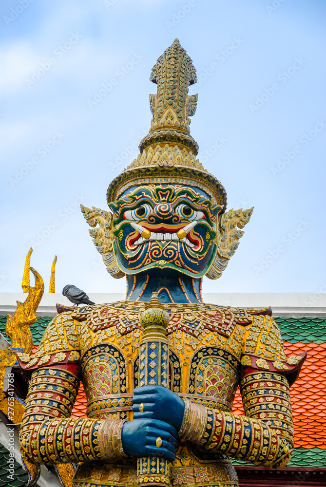 Detail of whole warrior figure decorated in buddhist temple, Bangkok, Thailand