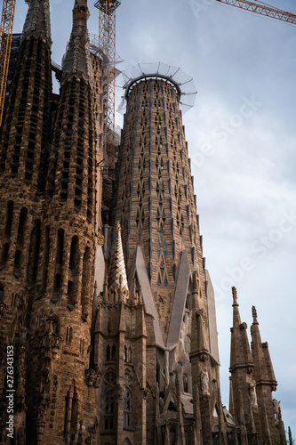 BARCELONA, SPAIN - April 2019: Sagrada Familia on April 9, 2018 in Barcelona, Spain. This impressive cathedral was originally designed by Antoni Gaudi is still being built since 1882.