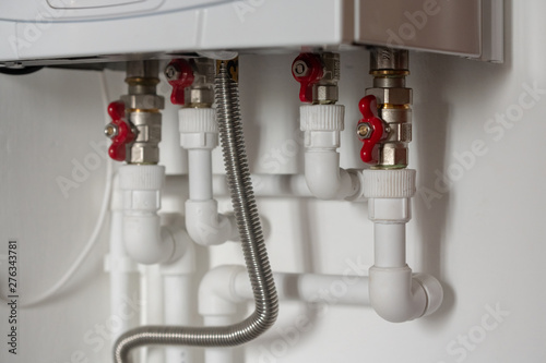 wiring of plastic pipes to the water heater in the apartment