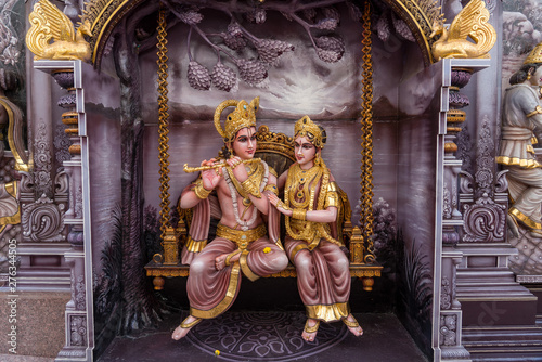 Colourful statues of Hindu religious deities in Hindu temple in Singapore	 photo