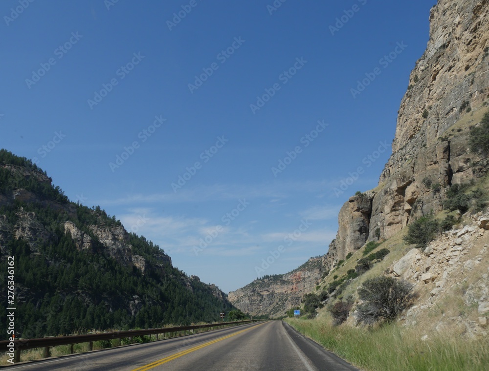 Fototapeta premium Scenic views along the road through the Bighorn Mountains in Wyoming, with incredible rock formations on both sides of the road. 
