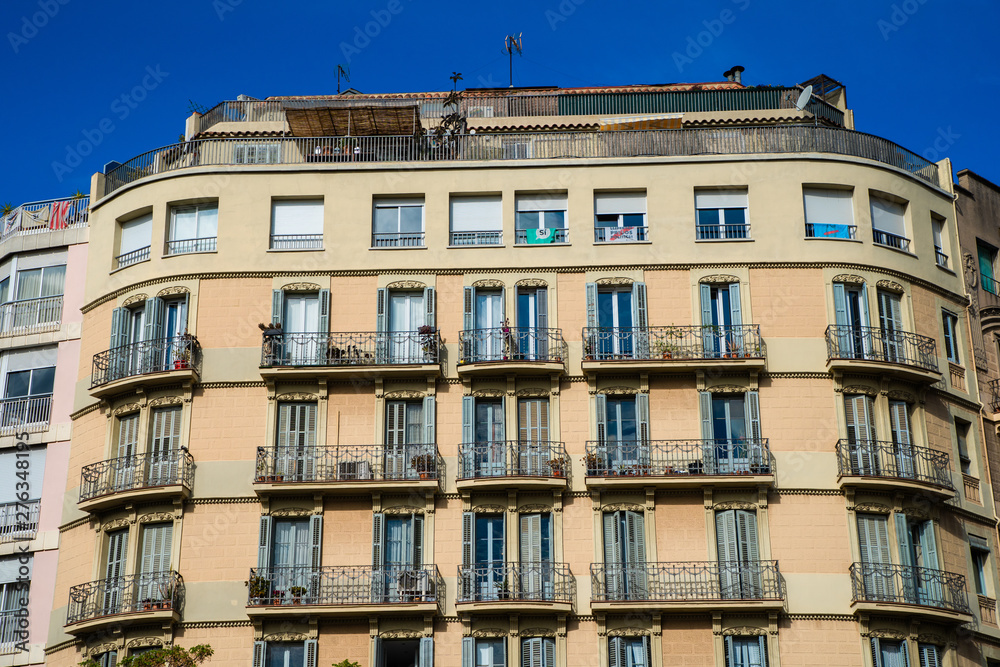 Fototapeta premium BARCELONA, SPAIN - April, 2019: Architectural buildings and street photography around the center of Barcelona city in a typical Summer day. Urban photography in Spain, Europe