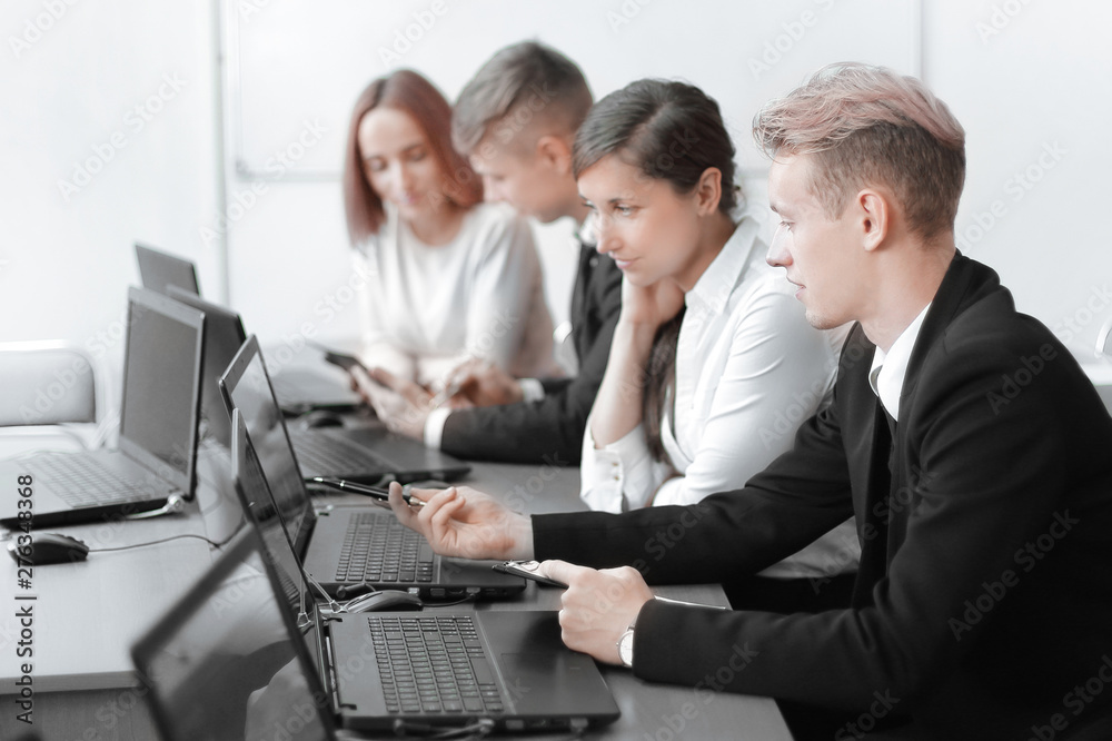 business team working with financial documents in the office business team working with financial documents in the office