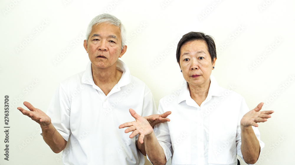 Asian senior couple unhappy angry deal with problem gesture expression Asian senior couple unhappy angry deal with problem gesture expression