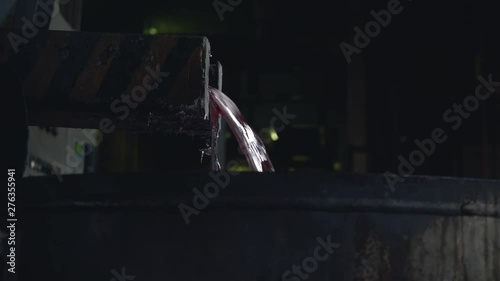 liquid aluminium is pouring-off, close-up, in car factory, Metallurgical plant