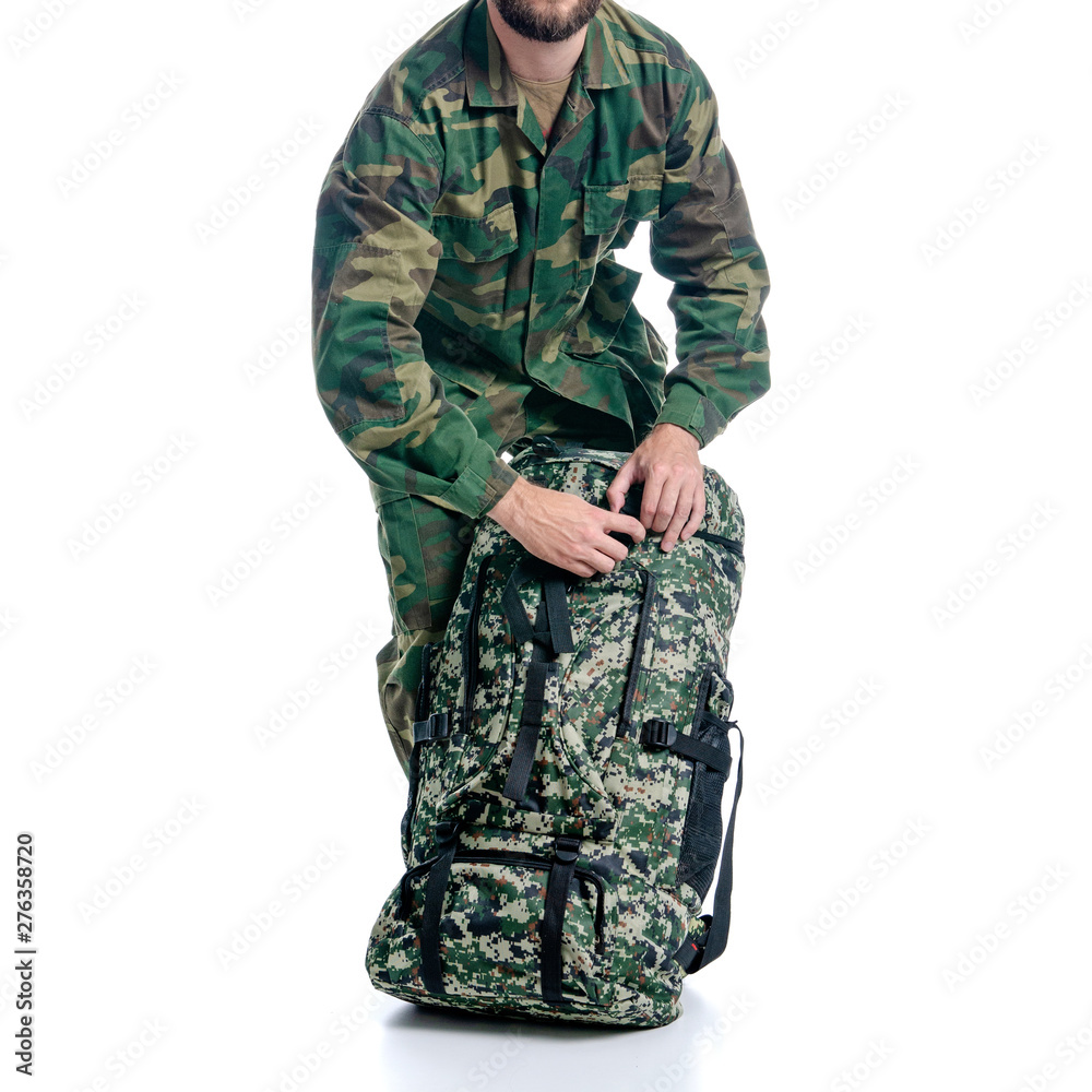Man in military uniform, camouflage with backpack on white background isolation