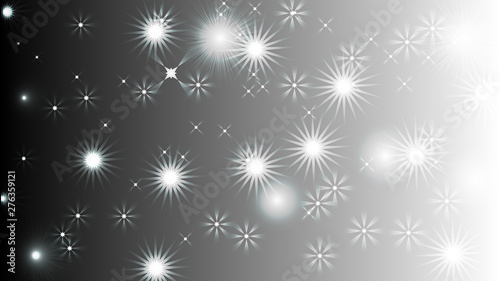 Black abstract light background with glittery colored shiny bokeh stars.