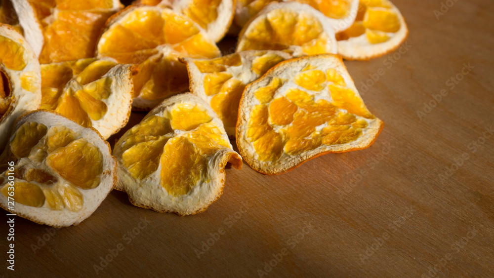 Natural Oranges Dried Sliced on a Wooden Background Natural Oranges Dried Sliced on a Wooden Background