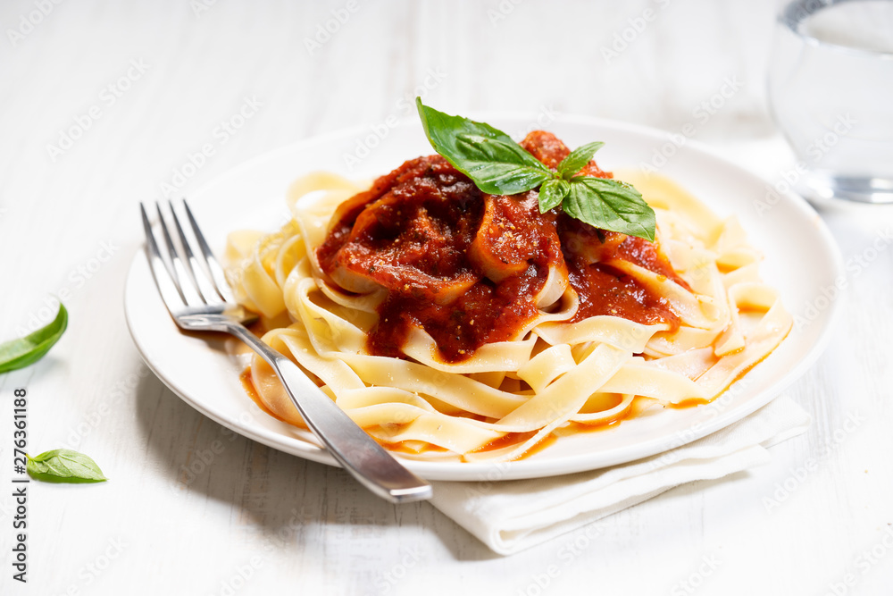 Pasta, fettuccine with tomato sauce Pasta, fettuccine with tomato sauce