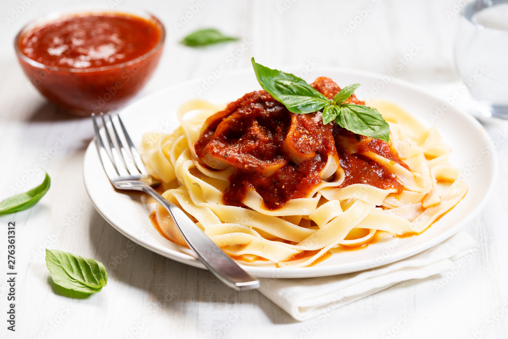 Pasta, fettuccine with tomato sauce Pasta, fettuccine with tomato sauce