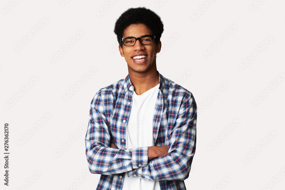 Happy Afro Student Standing with Arms Crossed Happy Afro Student Standing with Arms Crossed