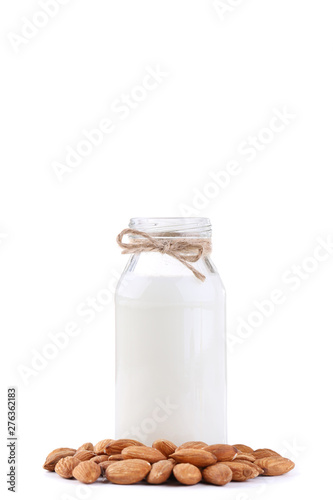 Almond milk in bottle isolated on white background