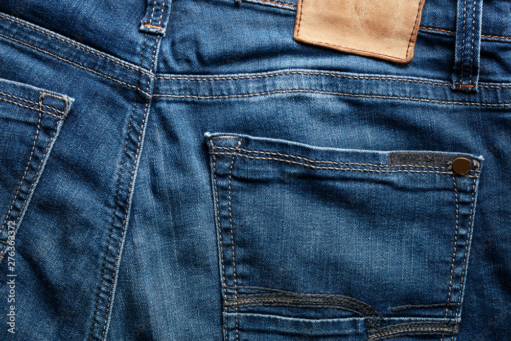 Back of an indigo color blue jean and its pocket Back of an indigo color blue jean and its pocket