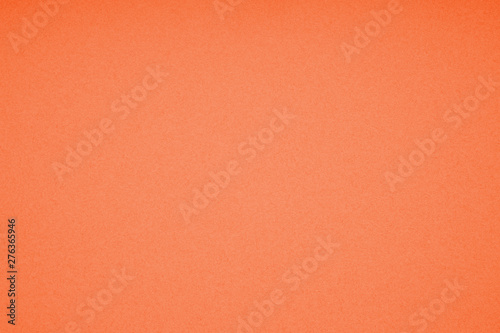 orange colored paperboard with paper texture background pattern