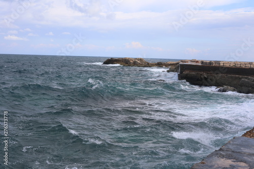 waves breaking on the rocks