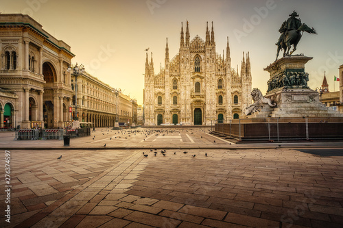 Milan Piazza del Duomo square. City center illuminated in the sunrise. Milano, Italy