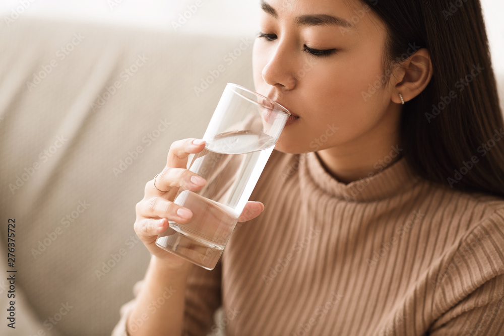 Healthy Liquid. Asian Girl Drinking Clean Water From Glass Healthy Liquid. Asian Girl Drinking Clean Water From Glass