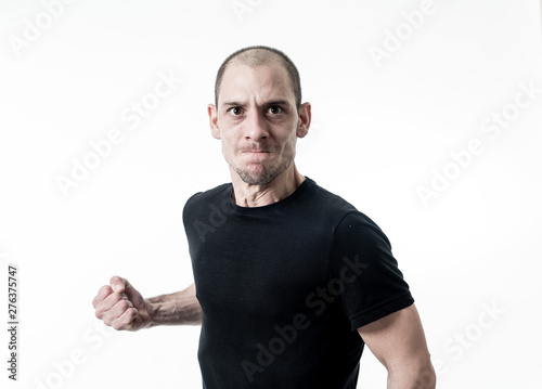 Mad and aggressive guy in facial expressions and negative human emotions