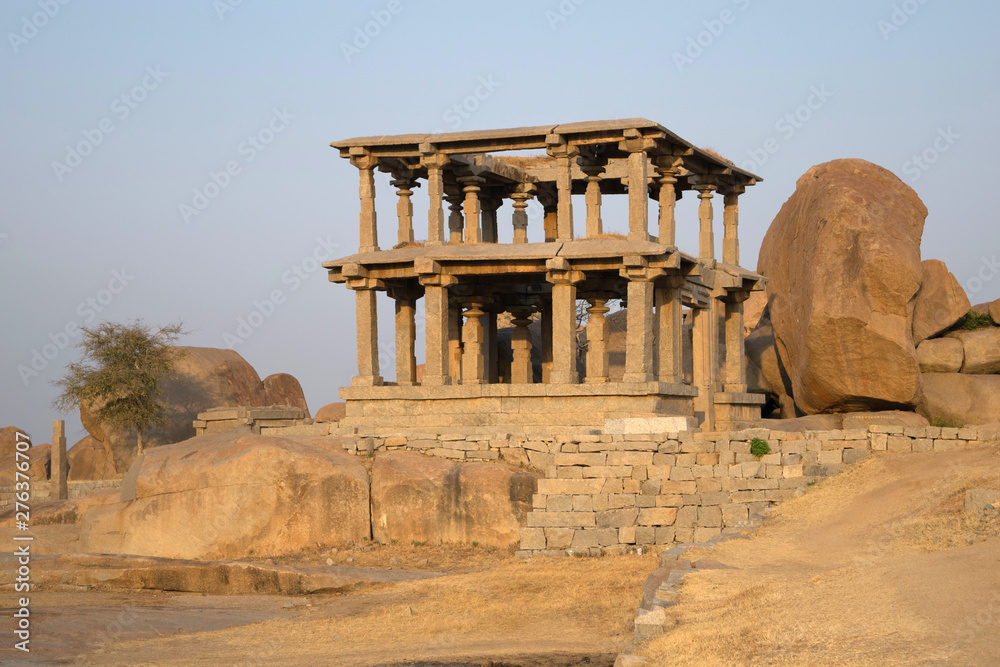 Ancient stone ruins at the Vittalla temple, Hampi popular for travelers