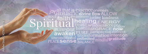 Spiritual Word Tag Cloud - Female cupped hands with the word SPIRITUAL floating between surrounded by a relevant word cloud against a blue purple jade background of feathers