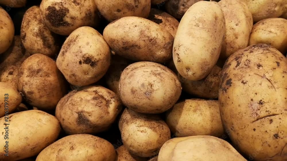 Potatoes on the counter in the market Potatoes on the counter in the market