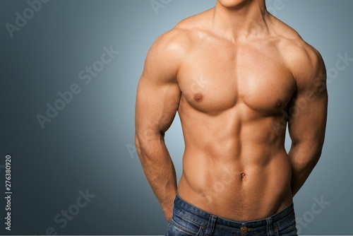 Cropped image of fit muscular body of sportsman